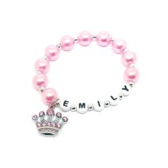 This adorable stretchy bracelet features a pink rhinestone princess tiara charm, 10mm pink acrylic pearl beads and acrylic alphabet beads all strung on durable stretch cord. Your bracelet will arrive in an organza bag making it ready to give as a gift. Please select the size needed from the drop down menu and enter the name you would like on your bracelet in the personalization box. Other name bracelets are available in my shop. To be the first to know about new items, sales and giveaways, mark Cheap Pink Bracelet With Custom Name, Custom Name Pink Bracelet For Birthday, Pink Name Bracelet For Birthday, Cute Pink Hypoallergenic Name Bracelet, Playful Pink Bracelets With Custom Name, Princess Tiara, Alphabet Beads, Pink Acrylics, Small Jewelry Box