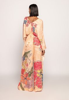 Editor's Note Elevate your style with this marigold bandhani print, part-hand micro-pleated kaftan. It boasts a drawstring waist, adjustable drawstring sleeves, and customisable side slits for a versatile and chic look. It comes with matching palazzo Asymmetric Blouse, Bandhani Print, Asymmetrical Blouse, Pop Up Event, Indian Fabric, Satin Color, Floral Print Blouses, Blouse Online, Indian Design