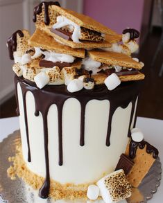 a cake with chocolate and marshmallows on top