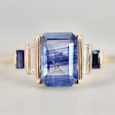 Blue Emerald Cut Sapphire Ring | $3,700 | Available at Gem Breakfast Sapphire Engagement Ring Blue