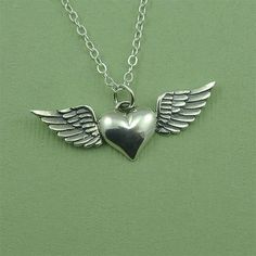 Heart with Wing Necklace - sterling silver heart wings jewelry - heart wings necklace Spiritual Winged Sterling Silver Jewelry, Sterling Silver Heart Charm Necklace For Memorial, Sterling Silver Heart Jewelry With Angel Wings, Spiritual Sterling Silver Heart Charm Necklace, Symbolic Heart-shaped Sterling Silver Necklace, Spiritual Sterling Silver Heart Pendant Charm Necklace, Spiritual Sterling Silver Charm Necklace With Heart Pendant, Spiritual Heart Shaped Sterling Silver Charm Necklace, Spiritual Heart-shaped Sterling Silver Charm Necklace