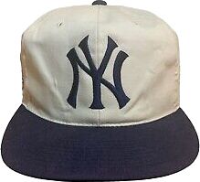 a new york yankees baseball cap on a white and blue hat with black brim