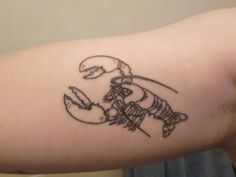 a person with a tattoo on their arm