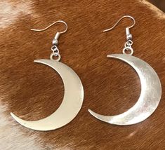 A lovely pair of drop silver moon earrings. Perfect for those who love lunar 🌙and the sky at night. Come gift wrapped. Made with love in my country cottage workshop. Have a great day! 🌙 Cottage Workshop, Silver Moon Earrings, The Sky At Night, Embroidered Elephant, Moon Drop, Sky At Night, Silver Turquoise Earrings, Ethnic Earrings, Silver Moon