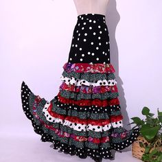 "Gorgeous flamenco dance skirt made of knitted fabric, adjustable to the waist and hip. Ideal for rehearsal and shows. Please bear in mind that the items are handmade-to-order and by assignment following the customer's instructions. If you need help taking your measurements, please have a look at this video: https://www.youtube.com/watch?v=jvGEVbgIXPU ------------------------------------------ Exchange and Return Policy At Morena Luna, we take pride in providing our customers with made-to-measure products that are tailored specifically to your preferences and requirements. Each product is meticulously crafted to meet your unique specifications, ensuring the highest level of quality and satisfaction. As a result of this personalised approach, we regret to inform you that we are unable to ac Red Bohemian Skirt For Dance, Fitted Can-can Skirt, Red Ruffled Skirt For Dance, Fitted Polka Dot Long Skirt, Fitted Long Skirt In Polka Dot, Bohemian Fitted Skirt For Dance, Fitted Bohemian Skirt For Dance, Red Summer Skirt With Attached Cancan, Summer Skirt With Attached Cancan In Red