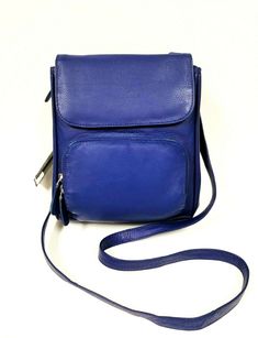 NEW MARCO AVANE NAVY, ROYAL  BLUE,FLAP,ZIP,SILVER ACCENT,CROSSBODY,SHOULDER BAG Brand New 100 % Authentic  OR YOUR MONEY BACK  Approximate Dimensions: 9.5"H x 7.75"L x 3.25"W UP TO 28" Crossbody Drop This beautiful handbag is made out of high quality genuine leather   Polished silver tone hardware Single Leather crossbody strap Top flap closure Zip pocket on the front Large all around zip pocket on the back INTERIOR Blue jacquard lining  2 compartments 6 slip pockets and 2 pencil holder slips Sl Blue Flap Bag With Adjustable Strap For Travel, Blue Flap Bag For Everyday Use, Everyday Use Blue Flap Bag, Blue Flap Bag For Daily Use, Royal Navy Blue, Beautiful Handbags, Polish Silver, Strap Top, Royal Navy