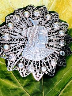 Antique large silver filigree Egyptian brooch. It measures approx 2 inches with a c clasp and acid test for sterling silver. Very solid & well crafted  Box for display only, not included  Free UK shipping PayPal payments are always helpful when possible ty Ornate Engraved Brooch, Ornate Filigree Pendant Brooch, Ornate Filigree Brooches For Ceremonial Use, Ornate Brooches With Intricate Design For Ceremonial Use, Ornate Filigree Brooches For Collectors, Vintage Style Handmade Silver Brooch, Unique Engraved Brooches As Gifts, Unique Engraved Brooches For Gift, Victorian Engraved Silver Brooches