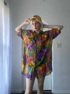 "Vintage 90s Bombay oversized shirt. 100% cotton. Made in India. Tropical floral/hibiscus print. Button front with 2 front pockets with button closures. Oversized style. Great worn long or tied up with a side knot. Light & airy. Good condition.  Flat Measurements:  20\" shoulder to shoulder  24\" pit to pit  33\" length  12\" sleeve" Trendy Cotton Hawaiian Shirt For Spring, Oversized Summer Camp Shirt With Camp Collar, Oversized Collared Summer Camp Shirt, Oversized Camp Collar Shirt For Summer, Oversized Collared Camp Shirt For Summer, Oversized Cotton Camp Shirt For Summer, Oversized Floral Print Shirt For Summer, Oversized Casual Camp Shirt For Summer, Oversized Spring Button-up Camp Shirt