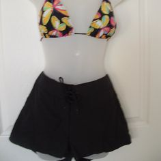 Really Cute Shorts They Can Be Worn Alone Or Over A Bathing Suit!! Tie In The Front And Velcro Side Pockets And Back Pockets Size M Waist Measures 15.5", Hips Measure 20"Inches Brand New With Tags, Never Worn Been Sitting In My Drawer!! Black Summer Shorts For Poolside, Black Short Swimwear, Black Short Summer Swimwear, Black Swimwear With Built-in Shorts For Summer, Fitted Black Swim Trunks For Vacation, Fitted Black Shorts For Poolside, Spring Beach Black Swim Trunks, Black Stretch Swim Trunks For Summer, Black Stretch Summer Swim Trunks