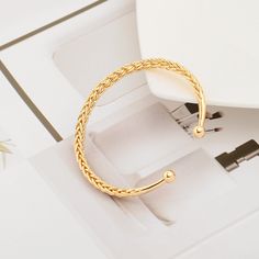 18k gold plated wheat chain twisted braided bracelets adds a feminine accent in any style. With its essential design, dainty gold bracelet wears well whether you're joining party, in the office or out with the girls. The cuff bracelet for women is very simple and aesthetic making you the focal point and more accentuating your personality. Exquisite craftsmanship provides comfortable wearing experience.  High polished rope bracelets offer a shining surface while smooth edge prevents your wrist from getting hurt or grazed. And gold bangles for women are plated in 18k gold brass for a trendy look, it will never fade, and do not turn your skin green, safe and healthy for sensitive skin. Gold bangle bracelets for women Inner Diameter: 2.36inches (60mm), Bendable stackable bracelet for women you Adjustable Braided Gold Bracelets, Adjustable Gold Braided Jewelry, Adjustable Braided Gold Jewelry, Gold Wheat Chain Bracelet As Gift, Gold Wheat Chain Bracelet Gift, Gold Braided Bracelets Gift, Gold Braided Bracelet Gift, Gold Braided Bracelet As Gift, Gold Braided Bracelet Perfect As A Gift