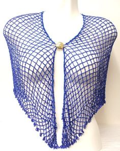 This shawl can be worn also as a wrap. The length of the shawl from hook to eye is approx. 33 inches, and there is a 4 inch extension on both sides.Using these extensions, you can move the eye and hook to suit your waist measurements. When worn on the hips, the center length is 9 inches in the center and 6 inches towards the eye and the hook (Excluding fringes) .All descriptions are approximate or estimate only. One Size Blue Shawl For Beach, Blue One Size Shawl For Winter, Blue One-size Winter Shawl, Blue Shawl Wrap, Blue Festival Scarf, One Size Blue Shawl For Festivals, Sequin Bra, Sequin Vest, Le Crochet