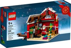 a lego christmas house is shown in the box