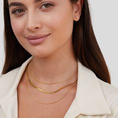 This Gold Multi-Layered Chain Necklace was crafted with elegance in mind. Beautifully designed to complete any outfit, this timeless piece is a must-have. Made with waterproof stainless steel, you never need to worry about fading or tarnishing jewelry ever again. Waterproof & tarnish-free Titanium steel Length: 15in (+ 2in adjustable ) Lobster clasp closure Hypoallergenic, lead & nickel free If you aren't in LOVE with your purchase, please let us know within 30 days of receiving your item, and y Minimalist Stainless Steel Jewelry With Gold Chain, Minimalist Stainless Steel Gold Chain Jewelry, Trendy Herringbone Necklace With Delicate Chain For Gift, Everyday Delicate Stainless Steel Chain Necklace, Everyday Stainless Steel Delicate Chain Necklace, Elegant Stainless Steel Snake Chain Necklaces, Elegant Stainless Steel Snake Chain Necklace, Classic Stainless Steel Chain Necklace For Gift, Classic Stainless Steel Snake Chain Jewelry