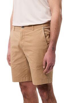 Classic and versatile, these shorts made of soft cotton sport a touch of stretch to keep you moving comfortably day and night. 8 1/2" inseam; 16" leg opening; 9 1/2" front rise; 13" back rise (size 29) Zip fly with button closure Front slant pockets; back button-welt pockets 97% cotton, 3% elastane Machine wash, dry flat Imported Cotton Mid-thigh Length Shorts In Solid Color, Relaxed Fit Bermuda Shorts With 5-inch Inseam, Fitted Cotton Shorts Mid-thigh Length, Fitted Cotton Mid-thigh Shorts, Fitted Cotton Mid-thigh Length Shorts, Cotton Bermuda Shorts With 5-inch Inseam For Summer, Stretch Cotton Bermuda Shorts Mid-thigh Length, Summer Cotton Bermuda Shorts, Fitted Cotton Athletic Shorts With Built-in Shorts