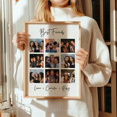 a woman holding up a framed photo with her friends pictures on it and the words big friends written in cursive writing