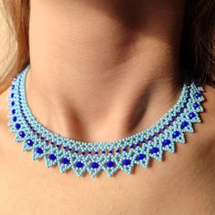 This handmade light blue bib necklace is carefully hand-woven from the highest quality glass seed beads and dark blue glass crystal beads! It fits perfectly around your neck thanks to the stainless steel clip and five cm extension chain. Fashionable beaded collar necklace, compatible with all your clothes that you can use in all seasons, is the ideal handmade gift jewelry for you and your loved ones! Guaranteed to get all the compliments! You can click the link for my other handmade jewelry and Blue Beads With Bead Caps For Jewelry Making, Handmade Blue Beads For Jewelry Making, Blue Beads With Bead Caps For Gifts, Blue Beaded Bib Necklace With Round Beads, Blue Bohemian Beaded Necklaces With Bead Caps, Blue Bohemian Beaded Necklaces, Blue Bohemian Necklaces With Bead Caps, Blue Beaded Crystal Necklaces With Round Beads, Blue Beaded Crystal Necklace With Round Beads