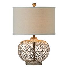 a table lamp with a white shade on it