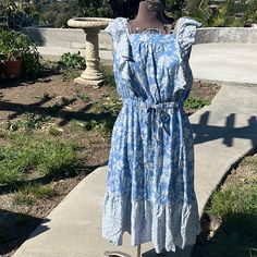 Luxology Blue &W Hits Floral Dress Flowy Stretch Waist Band Cap Flutter Ruffled Sleeves Sz Says S But Fits Larger More A M-L!! 100% Rayon Material ! It’s New Without Tags Never Worn Out Only Tried On!! Beautiful Questions? Leave A Comment Below! Blue Ruffled Sundress For Brunch, Blue Ruffled Sundress For Garden Party, Casual Blue Midi Dress With Flutter Sleeves, Blue Tiered Sundress With Ruffle Hem, Blue Flutter Sleeve Midi Dress For The Beach, Blue Ruffled Midi Sundress, Blue Midi Dress With Flutter Sleeve For Beach, Blue Midi Sundress With Ruffles, Blue Cotton Sundress With Ruffles