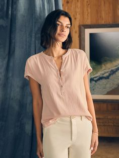 Crafted from our signature Dream Cotton — a breezy, airy organic double gauze fabric — this versatile top has a softly draped silhouette that's equally perfect for casual days, special nights and wherever else the warm weather takes you.   We recommend sizing down if you prefer a less relaxed fit.   Fit:﻿ Easy popover Womens Packing List, Gauze Blouse, Double Gauze Fabric, Women Rising, Gauze Fabric, Shell Buttons, Double Gauze, Woman Beach, Band Collar