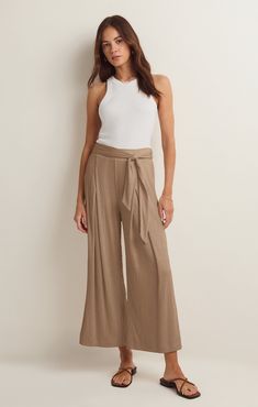 Take your casual look to the next level with the elevated, wide leg Isla Pucker Knit Pant. This pull on style features flattering details that will make this a pant you reach for on repeat. Casual High Waist Wide Leg Rayon Pants, Chic High-waisted Wide Leg Rayon Pants, Chic Wide Leg Pants For Loungewear, Wide Leg Rayon Lounge Pants, Chic Wide Leg Rayon Pants, Chic Rayon Wide-leg Pants, Trendy Wide-leg Bottoms, Chic Rayon Pants For Fall, Chic Non-stretch Wide Leg Loungewear Pants