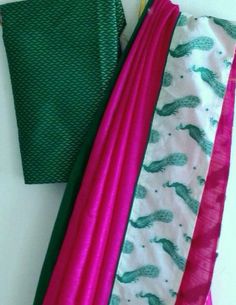 Hot pink semi silk saree with green peacock border and cotton brocade blouse Green Saree With Peacock Design In Traditional Drape, Festive Green Saree With Peacock Design, Pink Cotton Silk Saree With Zari Work, Pink Cotton Silk Blouse Piece With Pallu, Festive Chanderi Saree With Peacock Design, Unstitched Pink Traditional Wear With Border, Festive Pink Blouse Piece With Border, Pink Chanderi Blouse Piece With Printed Border, Navratri Pink Cotton Silk Blouse Piece