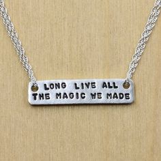 "Long live all the magic we made" is handstamped on a sterling silver bar, and hangs on sterling silver rope chain to create this ode to friendship necklace. Perfect gift for a best friend or fellow Swiftie.  Bar measure approximately 1" x 1/4". Meaningful Sterling Silver Friendship Necklace, Meaningful Sterling Silver Necklace For Friendship, Meaningful Adjustable Sterling Silver Charm Necklaces, Adjustable Sterling Silver Meaningful Charm Necklace, Adjustable Sterling Silver Meaningful Charm Necklaces, Meaningful Adjustable Sterling Silver Necklace, Silver Hand Stamped Necklace For Best Friend, Inspirational Silver Adjustable Necklace, Engraved Sterling Silver Charm Necklaces For Friendship