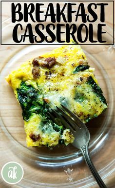 a close up of a plate of food on a table with a fork and text overlay that reads breakfast casserole