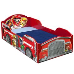 a red fire truck bed with blue sheets and pillows on the bottom, in front of a white background