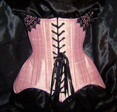 Pink Lace Underbust Corset, Pink Lace Trim Underbust Corset, Pink Underbust Corset With Lace Trim, Fitted Lace Corset For Cosplay, Fitted Coquette Corset Dress For Halloween, Fitted Halloween Corset Dress In Coquette Style, Gothic Lace Corset For Cosplay, Pink Lace Corset With Boned Bodice, Pink Fitted Underbust Corset