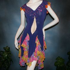 will fit size 5/6-11/12, very stretchy Be bold and express yourself in this Latin-rhythm dress that converts to a ballroom dress, crafted from luxurious deep periwinkle purple slinky stretch fabric featuring vibrant floral print accents. The eye-catching details don't stop there: embellishments of silk flowers & Swarovski rhinestones add a touch of sparkle, while the wrap-style long skirt brings movement and drama with yards of petal-like chiffon panels. A great buy, as to have a similar custom Fitted Purple Dance Dress, Fitted Purple Dress For Dance, Fitted Ballroom Dress For Summer, Fitted Summer Ballroom Dress, Blue Summer Dance Dress, Purple Fitted Dress For Ballroom, Fitted Blue Ballroom Dress, Blue Stretch Dresses For Ballroom, Deep Periwinkle