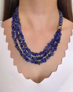 Lapis Lazuli Chunky Beaded Multistrand Necklace ✅ NECKLACE FEATURES * Handmade Item: each necklace is meticulously crafted by hand, ensuring quality and uniqueness. * Materials: 10 mm lapis lazuli and raw lapis lazuli natural stone, gold-plated details and chain * Length: 48 cm (19 inches) + 5 cm (2 inches) adjustment chain.    -If you require a longer extension chain, please let me know. * Color Discrepancies: Please be aware that color variations may occur due to different monitor settings. * Natural Stone Variations: Natural stones may vary slightly in size, shape, and color tones due to their unique characteristics. These small differences make your jewelry special and one-of-a-kind. ⭐️ This elegant necklace is crafted with 10 mm lapis lazuli and raw lapis lazuli stones, celebrated for Blue Gemstone Beads Necklace For Wedding, Blue Gemstone Beads Necklaces For Party, Blue Gemstone Beads Necklace For Party, Blue Single Strand Beaded Necklace For Wedding, Blue Single Strand Wedding Necklace, Blue Gemstone Beaded Necklaces For Party, Blue Wedding Jewelry, Anniversary Gift For Wife, Mother Birthday