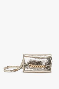 Elevate your new season wardrobe by accessorizing with this metallic Mini Chain Pouch. Subtly textured to bring depth and warmth to whatever you wear, the Mini Chain Pouch is embellished with the brand’s signature gold-tone chain detail and lined in sumptuous suede. Wear it as a shoulder or crossbody bag, or remove the strap entirely for versatile styling as a clutch. Subtly Textured Style Metallic Finish Iconic VB Watch Chain Strap Removable Long Strap Suede Lining Height: 12cm, Width: 18.5cm, Designer Gold Clutch With Chain Strap, Elegant Leather Clutch With Chain Detail, Chic Gold Clutch With Metal Hardware, Elegant Leather Clutch With Chain, Luxury Gold Clutch With Chain Strap, Luxury Gold Clutch With Gold-tone Hardware, Leather Evening Clutch With Chain, Gold Leather Bags With Chain Strap, Elegant Metallic Bag With Chain Strap