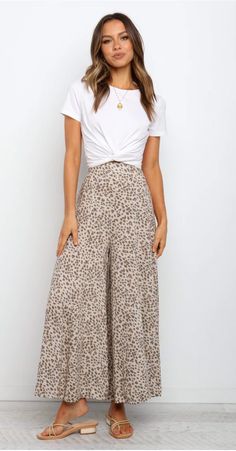 These pants are the perfect addition to your wardrobe! With a high waisted fit and elasticised back, they are lightweight and comfortable for all day wear. The relaxed fit will give you plenty of room to move, while still giving you an elevated look that is sure to turn heads.

    high waisted
    elasticised at back
    lightweight
    unlined House Wear Outfits Casual, Effortless Summer Loungewear Pants, Effortless High-waisted Loungewear Pants, Effortless Spring Vacation Bottoms, Loosely Fitted Harem Pants For Day Out, Relaxed High Waist Wide Leg Pants For Spring, Effortless Wide Leg Loungewear Bottoms, Effortless Summer Loungewear Bottoms, Effortless High-waisted Loungewear Bottoms