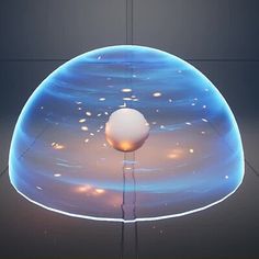 an image of a very large object in the middle of a room with lights on it