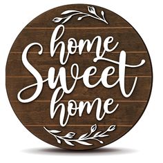 a wooden sign with the words home sweet home written in white on top of it