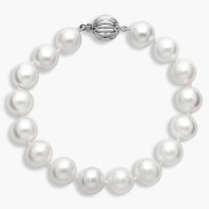 Add a timelessly sophisticated touch to your style with this simple yet classic bracelet of softly gleaming 9-10mm freshwater pearls. The white gold design promises enduring quality and luxury. Luxury White Gold Pearl Oyster Bracelet, Timeless Silver Pearl Jubilee Bracelet, Timeless Silver Pearl Bracelets, Elegant Sterling Silver Oyster Bracelet For Formal Occasions, Classic White Gold Bracelets With Sterling Silver Clasp, Classic Sterling Silver Bracelet With Round Beads, Timeless White Sterling Silver Bracelet For Anniversary, Formal Pearl White Bracelet With Pearl Chain, Timeless White Gold Pearl Bracelet For Anniversary