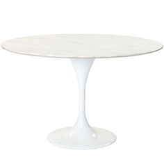 a white table with a marble top and pedestal base on an isolated white background for use as a dining room or office space