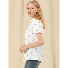 Graceful and elegant, this top with fresh flowers features a button-down and ruffle cuff. With the lightweight and soft fabric, this top with a romantic purple or pink floral print brings you a summer feeling. Suitable for any cool-weather situation. This shirt will bring you a different sense. Get this bubble short-sleeve top to add to your wardrobe's summer sense. Spring Floral Print Button-up Top, White Short Sleeve Button-up Shirt With Floral Print, White Floral Print Short Sleeve Button-up Shirt, Classic Floral Print Button-up Top, Floral Print Peter Pan Collar Summer Top, Frill Shorts, Frill Blouse, Frill Tops, Pink Floral Print