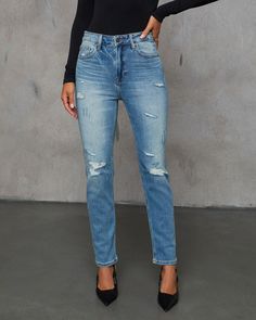 Get ready, get set and dive into the season with the perfect mix of cool and casual with the Kravita High Waisted Distressed Mom Jeans. Crafted from stretch denim, these jeans offer that just-right blend of comfort and style, making them your new go-to for fall. Light whiskering and artfully distressed details add a touch of edgy flair, perfect for those crisp autumn days when you want to keep things relaxed yet undeniably chic. Runs large, consider sizing down Stretch denim fabric Light whiskering and intentionally distressed areas Zip fly with button closure 5-pocket styling 93% Cotton 5% Polyester 2% Spandex Distressed Mom Jeans, Crisp Autumn, Stretch Denim Fabric, Autumn Days, Fabric Light, Denim Fabric, Distressed Jeans, Get Ready, Stretch Denim