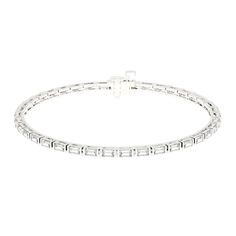 A baguette bar bracelet features a sleek, horizontal bar set with baguette-cut diamonds or gemstones. The clean lines and elongated shape of the baguette cuts create a sophisticated and modern look, while the bar setting adds a touch of understated elegance. Custom made to order. Please allow 2-3 weeks for delivery Bar Setting, Bar Bracelet, Baguette Cut Diamond, Bar Bracelets, New Bands, Baguette Cut, Custom Jewelry Design, Understated Elegance, Bar Set