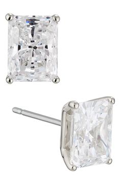 Emerald-cut cubic zirconia in prong settings make these stud earrings irresistibly sparkly for day or night. Post back Total cubic zirconia weight: 6.00ct. 18k-gold plate or rhodium plate/cubic zirconia Imported Emerald Cut Stud Earrings, Solitaire Setting, Modern Love, Cubic Zirconia Earrings, Zirconia Earrings, Emerald Earrings, Fashion Jewelry Earrings, Accessories Jewelry Earrings, Online Earrings