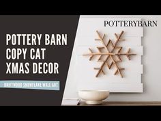 pottery barn copy cat xmas decor is displayed in front of a white wall art