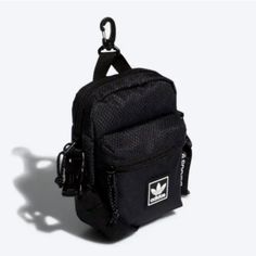 Adidas Originals Utility Festival 2.0 Crossbody Bag New With Tags Casual Adidas Nylon Bags, Black Chest Bag Backpack For Mobile Phone, Black Crossbody Backpack With Cell Phone Pocket, Functional Black Backpack With Mobile Phone Bag, Black Bags With Zipper Closure For Streetwear, Black Chest Bag Backpack For Streetwear, Black Streetwear Bag With Zipper Closure, Adidas Nylon Bag With Adjustable Strap, Adidas Black Backpack For Streetwear