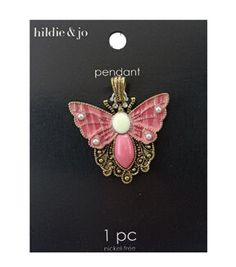 a pink butterfly brooch with pearls on it's wings and the words, hide & go pendant