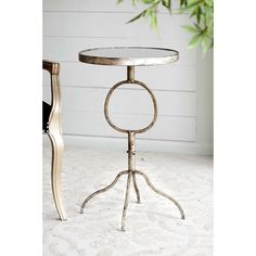 Add versatility and unique character to your interior with the end table by A and B Home. Set this table in the entryway, hallway, living room, office or any room that is missing something practical, while accentuating the decor. The modern design combined with an aged gold finish, lends glamorous contrast to this piece. It is made from durable metal frame and glass top, making it long-lasting and hardwearing. Place this piece to instantly liven up your space, giving it a warm and welcoming touch. Bring one-of-a-kind look to your interior with furniture from A and B Home! A&B Home 22.7-in W x 27.5-in H Aged Gold Glass Modern End Table Fully Assembled | AV37815 Modern End Table, Accent Side Table, Design Library, A&b Home, Modern End Tables, Oval Table, Oval Mirror, Gold Glass, Metal Base