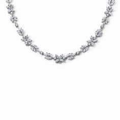 This special modern estate necklace was designed with a floral motif comprised of marquise diamonds and full cut round diamonds. Available in Platinum Diamond weight = 17.5 carats Diamond quality = G/H color, VS/VS2 clarity Necklace length = 16.25in Clasp is a diamond flower Center flower features an enhancer bail and can be used to add a charm. This can be removed upon request. Estimated from the 1990s Vintage and Antique jewelry should be handled and worn with extra care. This item is FINAL SA Formal Bridal Marquise Diamond Necklace, Formal Marquise Cut Diamond Necklace, Silver Marquise Bridal Necklace For Formal Occasions, Formal Silver Marquise Bridal Necklace, Silver Marquise Cut Diamond Necklace For Formal Occasions, Silver Marquise Cut Diamond Necklace, Luxury Marquise Cut Cubic Zirconia Necklace, Silver Marquise Necklace For Formal Occasions, Luxury Cubic Zirconia Marquise Cut Necklace