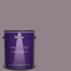 a purple paint can with the words marquee on it's bottom half