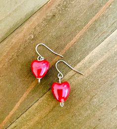 These dainty red ceramic heart earrings are very dainty and classic.  They are just in time for Valentine's Day!  They are cute and small at about 1 inch in length.  They definitely are for anyone that loves small earrings.  The red ceramic lovlies are very light on the ears.   ~I use high quality hypoallergenic materials along with many different colors and types of beads and charms.  I work hard to create beautiful pieces and to provide excellent customer service.   They come on a lovely earring card and are placed in a white drawstring organza bag. Your package will include a thank you card with my deepest appreciation to all customers. Other metal earrings in the shop: https://www.etsy.com/shop/ValsJewelrySpot?load_webview=1&bid=l1H_tgWpczxPIb4cpQERV3KmWE5L&section_id=35887021 Valentines Day Jewelry, Bead Heart, Gold Filigree Earrings, Boho Hoop Earrings, Red Heart Earrings, Gold Heart Earring, Dangle Earrings Boho, Red Ceramic, Ceramic Heart