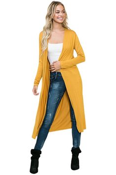 Bring a dash of style to breezy days with this Long Sleeve Solid Maxi Cardigan from Iconic Luxe. Tailored in a regular fit with a length that hits at the knees, this long-sleeve cardigan is crafted from a lightweight fabric for a cozy feel. Designed in a solid hue, you can layer the cardigan over tops or dresses for versatile styling options. 95% Rayon, 5% Spandex Made in the USA Pull On closure Features: open front, long sleeves, midi length, lightweight fabric Suit for: work, casual, everyday wear, date night, movie night, brunch, farmers market, vacation, traveling, beach, barbeque party, coffee date, school Season: spring, summer, fall, winter Model is 5’7” and wearing size Small. Hand wash cold. Do not bleach. Hang to dry. Solid Color Long Cardigan For Fall, Long Solid Color Cardigan For Fall, Solid Long Cardigan For Fall, Trendy Stretch Cardigan In Solid Color, Trendy Solid Color Open Front Sweater Coat, Trendy Solid Open Front Sweater Coat, Trendy Solid Color Stretch Cardigan, Trendy Open Front Solid Sweater Coat, Trendy Stretch Solid Color Cardigan