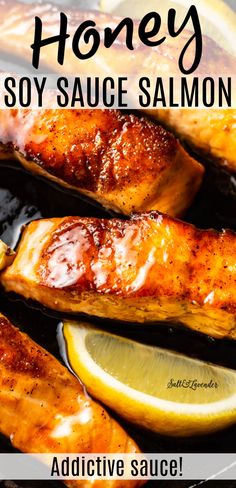 honey soy sauce salmon in a pan with lemon wedges